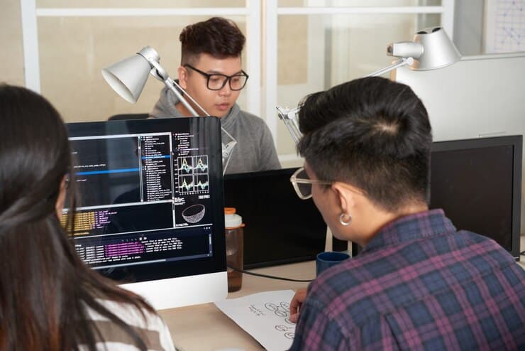 Programmer Working at Office